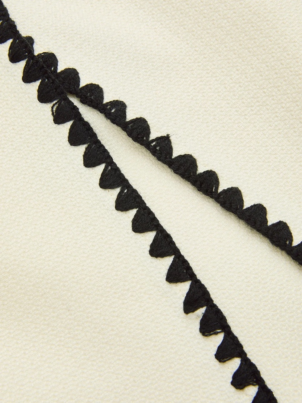 25 Scalloped Trim Asymmetrical Mini Skirt - Picture 4 of 5